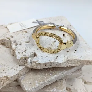 Leather inlay bangle with textured oval component